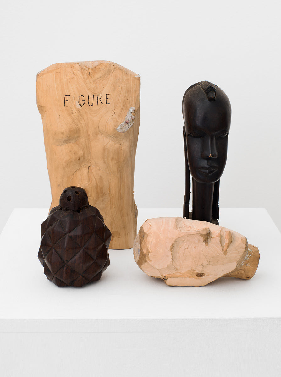 A Torso and Ebony Shaped Head as Pineapple & Ebony Head of Woman